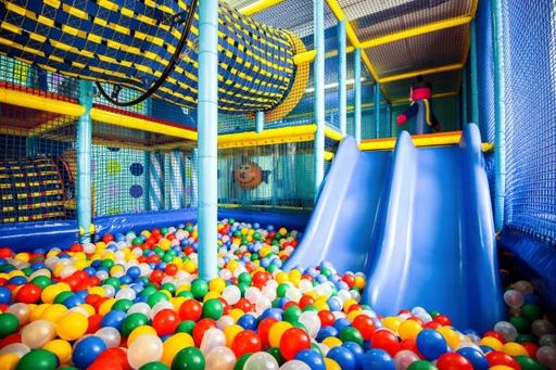 Indoor Kids Play Area amenity image at Flora Isle Beachfront Residences