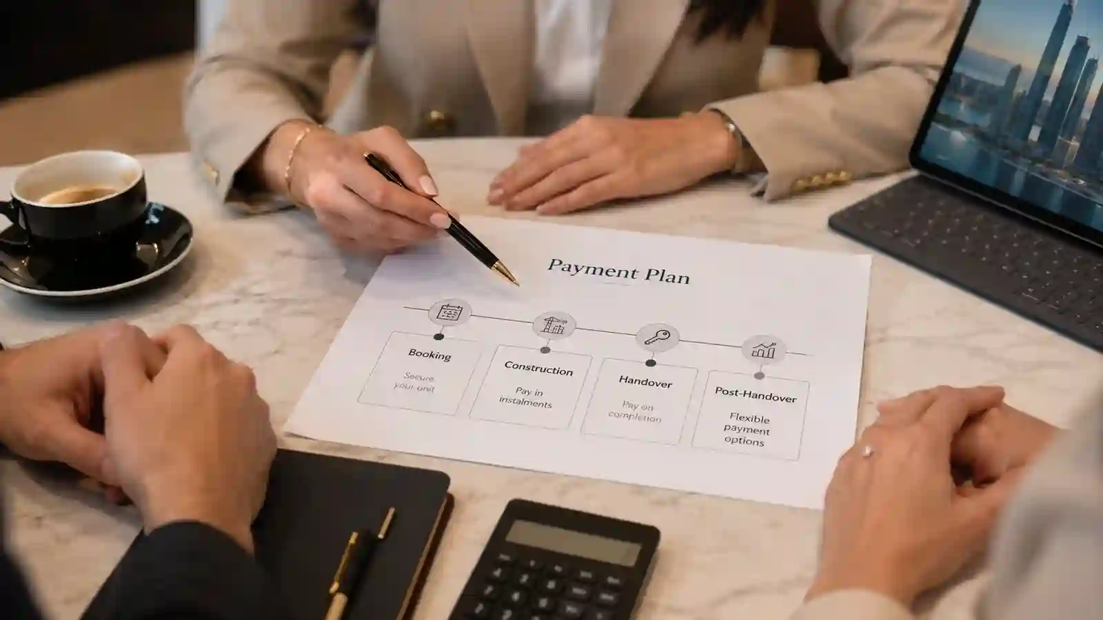 Dubai off-plan payment plan explained with a buyer and property consultant reviewing an instalment schedule