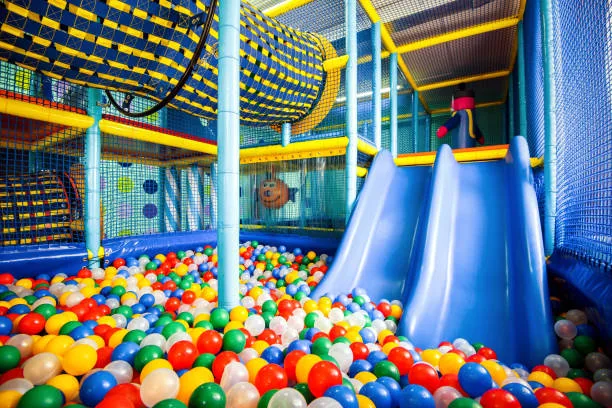 Indoor Kids Play Area amenity image at Flora Isle Beachfront Residences