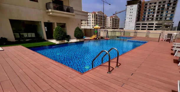 Uncovered Soothing Swimming Pool amenity image at G24 Warsan