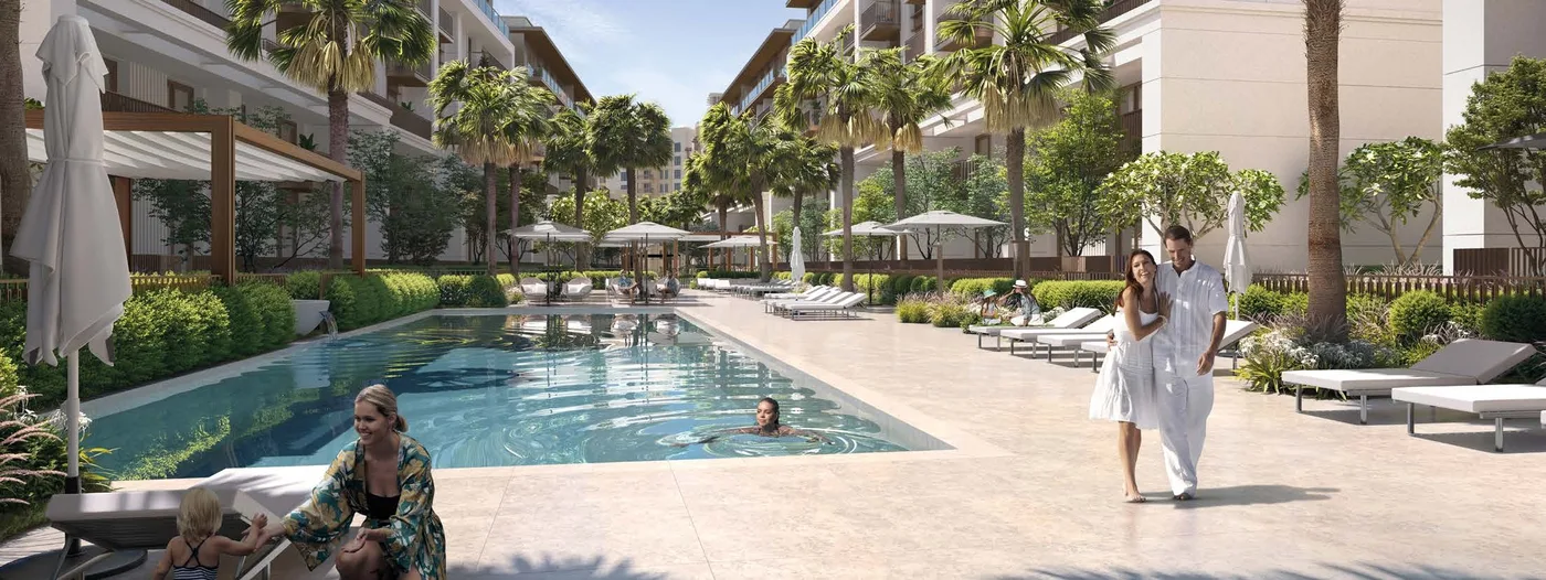 Shimmering Pool Surrounded By Lush Landscape amenity image at MJL Jomana